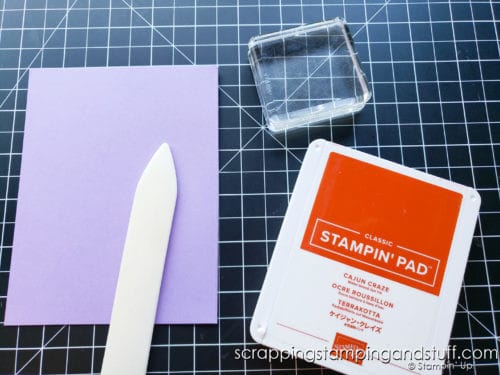 A paper bone folder is a tool to help score and crease paper. It's a must-have tool for any crafter's collection. Learn all about it here!