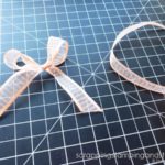 Learn to tie a bow your first try using this no fail bow tying tip for beginners! Perfect for crafts, card making, scrapbooking, gift wrap and more!