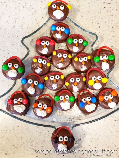 Take a look at our fun food Christmas celebration featuring snowman pizza, Christmas tree bread, a wreath relish tray, santa hat brownies, penguin oreos and Grinch punch!